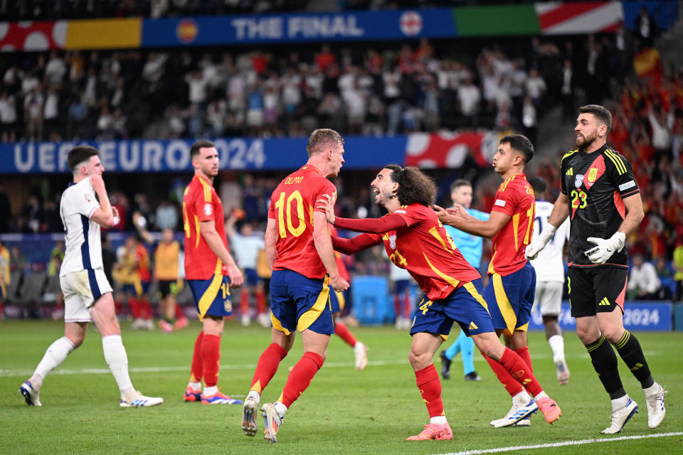 Spain's forward #10 Daniel Olmo, Spain's defender #24 Marc Cucurella, Spain's midfielder #18 Martin Zubimendi and Spain's goalkeeper #23 Unai Simon react during the UEFA Euro 2024 final football match between Spain and England at the Olympiastadion in Berlin on July 14, 2024. (Photo by Kirill KUDRYAVTSEV / AFP) (Photo by KIRILL KUDRYAVTSEV/AFP via Getty Images)