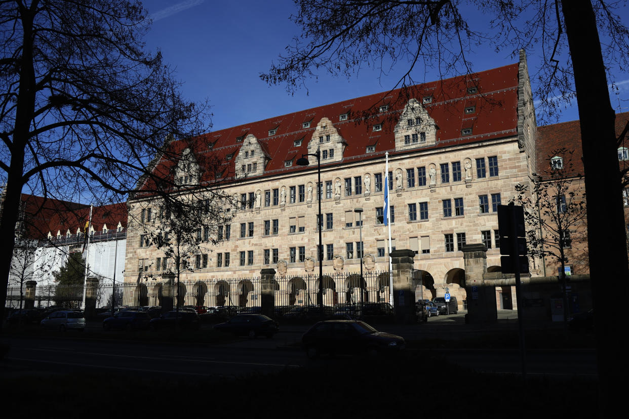 Trees stand in front of the palace of justice in Nuremberg, Germany, Wednesday, Nov. 18, 2020. Germany marks the 75th anniversary of the landmark Nuremberg trials of several Nazi leaders and in what is now seen as the birthplace of a new era of international law on Friday, Nov. 20, 2020. (AP Photo/Matthias Schrader)