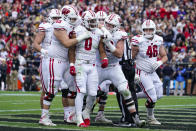 Wisconsin running back Braelon Allen (0) celebrates a touchdown with teammates during the first half of an NCAA college football game against Purdue in West Lafayette, Ind., Saturday, Oct. 23, 2021. (AP Photo/Michael Conroy)