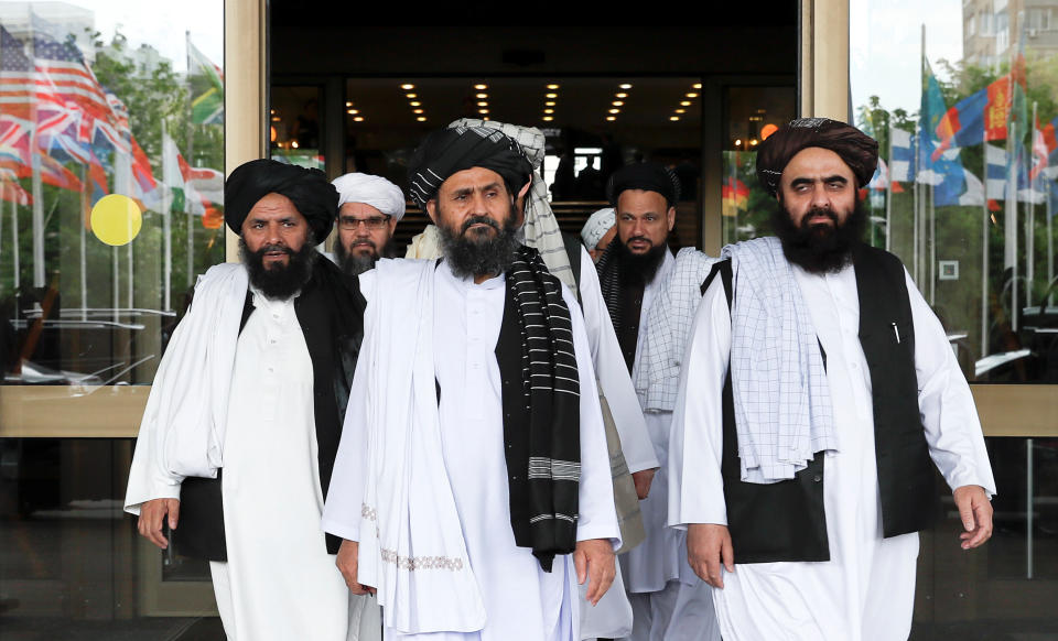 Members of a Taliban delegation, led by chief negotiator Mullah Abdul Ghani Baradar (C, front), leave after peace talks with Afghan senior politicians in Moscow, Russia on May 30, 2019. (Evgenia Novozhenina/Reuters)