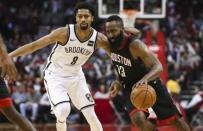 Nov 27, 2017; Houston, TX, USA; Houston Rockets guard James Harden (13) dribbles the ball as Brooklyn Nets guard Spencer Dinwiddie (8) defends during the third quarter at Toyota Center. Mandatory Credit: Troy Taormina-USA TODAY Sports