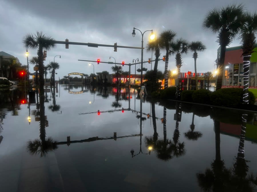 Main Street in North Myrtle Beach, S.C. was flooded on Wednesday, Aug. 30, 2023 after the passage of Hurricane Idalia. (Jason Lee/The Sun News via AP)