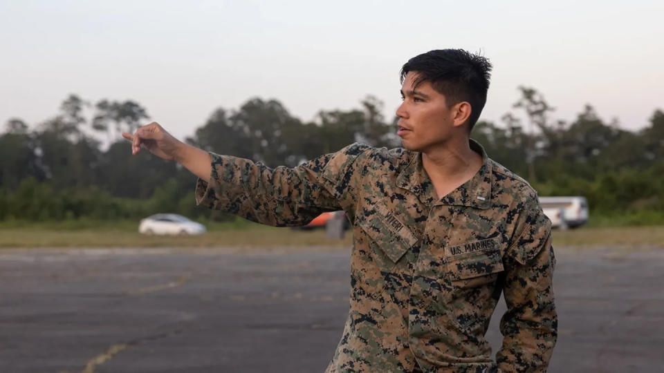 First Lt. Anthony Viteri, a combat engineer officer with Marine Wing Support Squadron 271, directs aircraft with Marine Heavy Helicopter Squadron 461 at Marine Corps Landing Outlying Field Oak Grove, N.C., Aug. 13. (Lance Cpl. Orlanys Diaz Figueroa/Marine Corps)