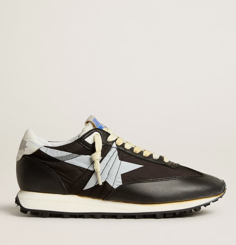 <p><a href="https://www.goldengoose.com/us/en/men%E2%80%99s-marathon-with-black-nylon-upper-and-white-star-cod-GMF00683.F005459.90167.html" rel="nofollow noopener" target="_blank" data-ylk="slk:Shop Now;elm:context_link;itc:0" class="link ">Shop Now</a></p><p>Marathon Sneaker</p><p>goldengoose.com</p><p>$545.00</p>