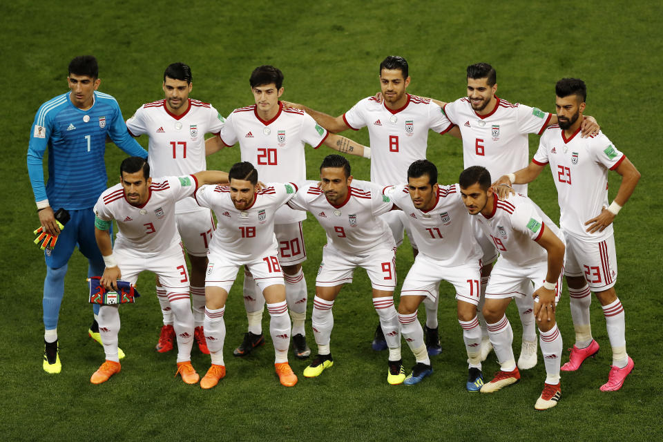 FILE - Iran national soccer team players pose prior to the start of the group B match between Iran and Portugal at the 2018 soccer World Cup at the Mordovia Arena in Saransk, Russia, Monday, June 25, 2018. Japan and South Korea will start fine-tuning for the World Cup with high-profile warm-ups against Brazil next month but there's concerns in Iran that Asia’s top-ranked team has been slow off the mark with its preparations. Iran is in Group B with England and the United States at the World Cup which kicks off Nov. 21 in Qatar. (AP Photo/Darko Bandic, File)