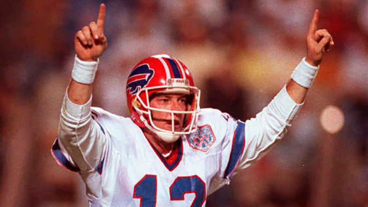 Mandatory Credit: Photo by Lennox Mclendon/AP/Shutterstock (6577766a)JIM KELLY Buffalo Bills quarterback Jim Kelly celebrates the Bills first touchdown against the New York Giants in Super Bowl XXV in Tampa onSUPER BOWL BILLS GIANTS KELLY, TAMPA, USA.