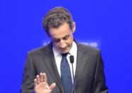 Right-wing incumbent candidate Nicolas Sarkozy addresses his supporters after the second round results of the French Presidential elections in Paris at " La Mutualite"