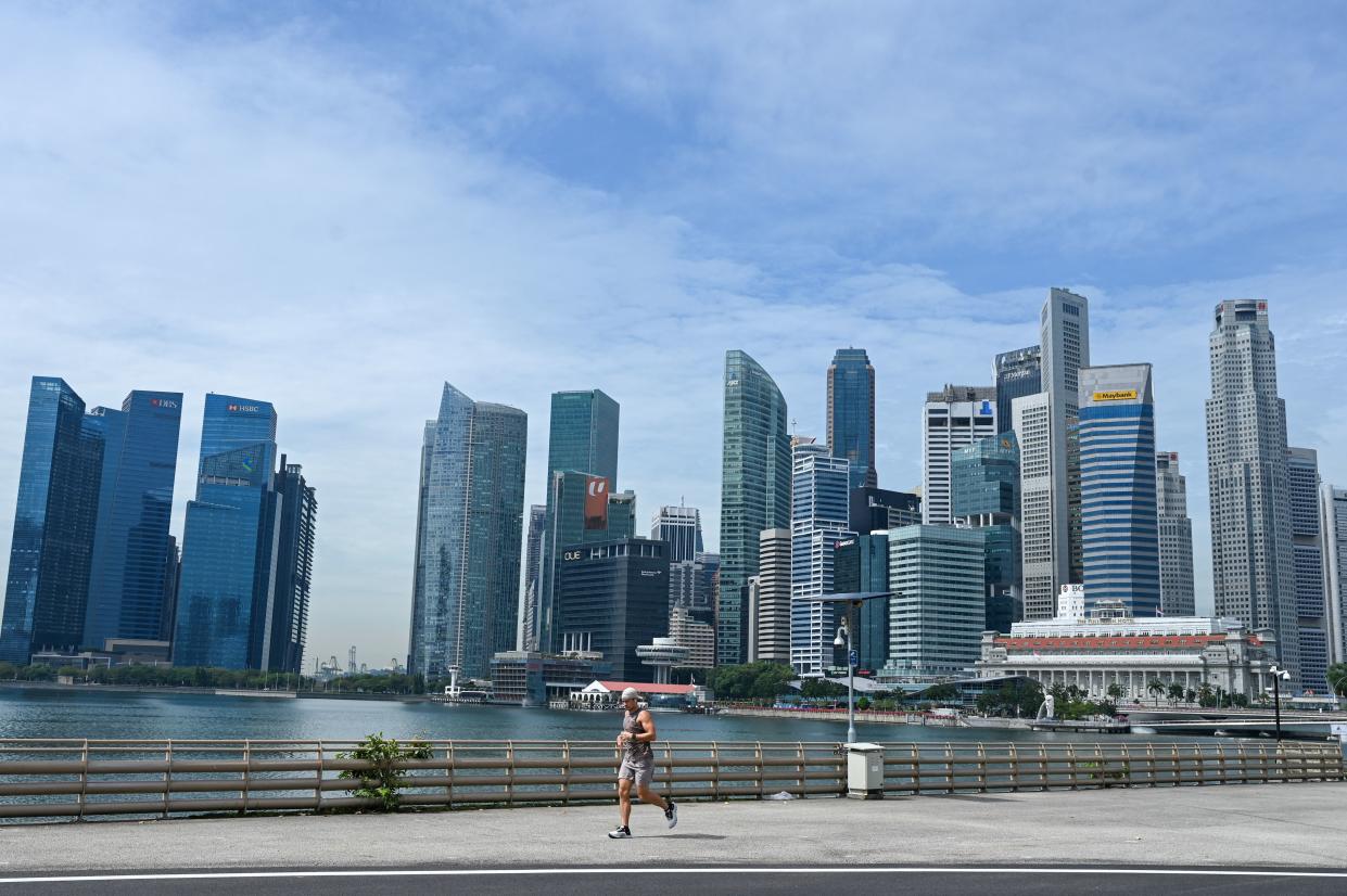 Singapore passes law to tighten rules for crypto providers. (PHOTO: ROSLAN RAHMAN/AFP via Getty Images)