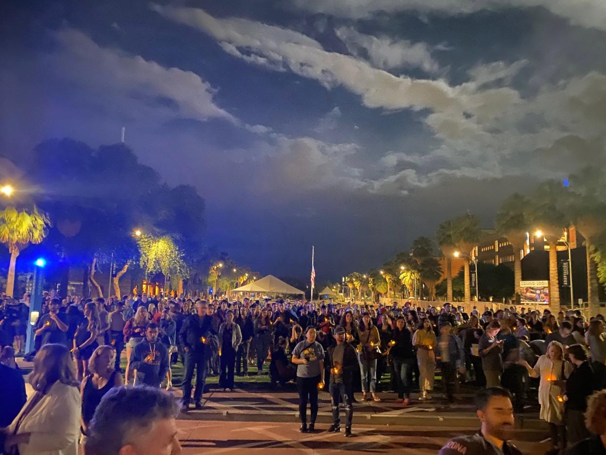 Students, staff and community members gathered in remembrance of slain professor Thomas Meixner at the University of Arizona campus on Oct. 7, 2022.