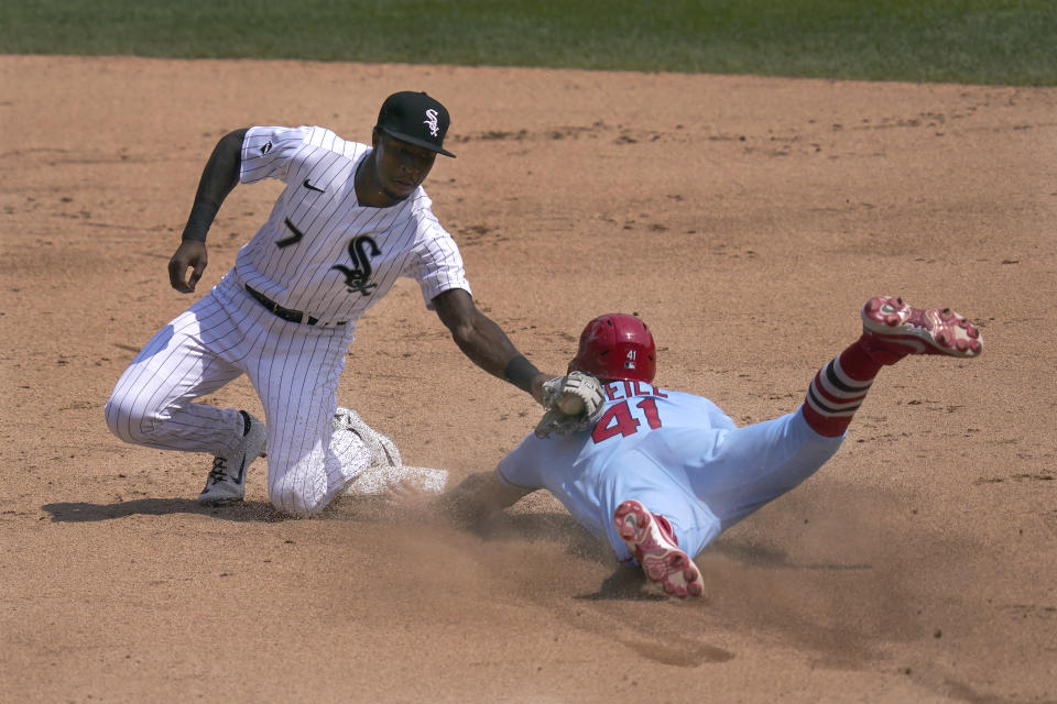 Chicago White Sox shortstop Tim Anderson catches St. Louis Cardinals' Tyler O'Neill trying to steal second during the fifth inning in Game 1 of a double-header baseball game Saturday, Aug. 15, 2020, in Chicago. (AP Photo/Charles Rex Arbogast)