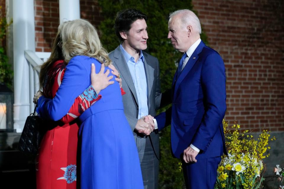 U.S. President Joe Biden and first lady Jill Biden are greeted by Prime Minister Justin Trudeau and his wife Sophie Gregoire Trudeau at Rideau Cottage, Thursday, March 23, 2023, in Ottawa, Canada.