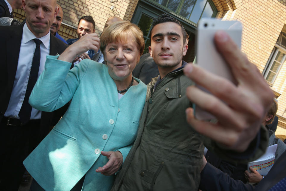 German Chancellor Angela Merkel poses for a selfie with a Syrian migrant at the&nbsp;AWO Refugium Askanierring shelter for migrants on Sept. 10, 2015 in Berlin, Germany.