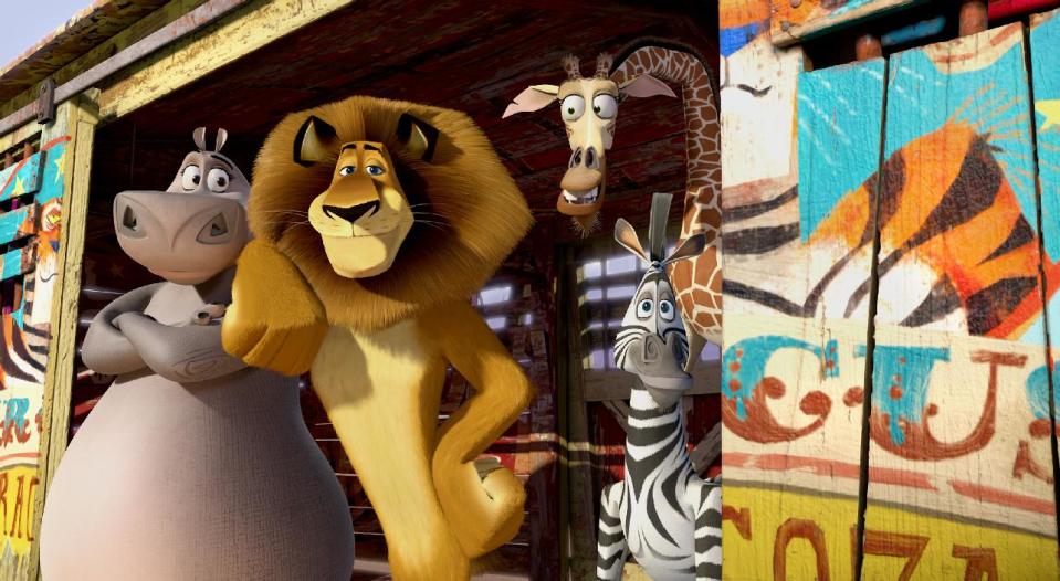 This film image released by DreamWorks Animation shows, Gloria the Hippo, voiced by Jada Pinkett Smith, from left, Alex the Lion, voiced by Ben Stiller, Melman the Giraffe, voiced by David Schwimmer, and Marty the Zebra, voiced by Chris Rock in a scene from "Madagascar 3: Europe's Most Wanted." (AP Photo/DreamWorks Animation - Paramount Pictures)