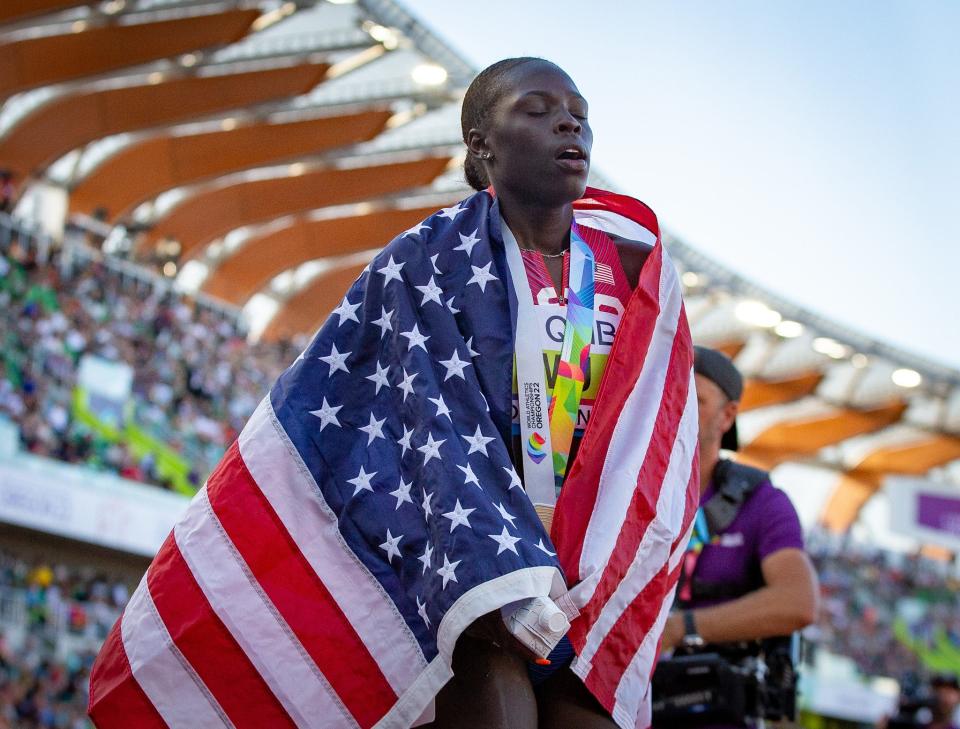 Team USA’s Athing Mu pauses for a moment after winning gold in the women’s 5,000 meters at the World Athletics Championships on Sunday at Hayward Field in Eugene.