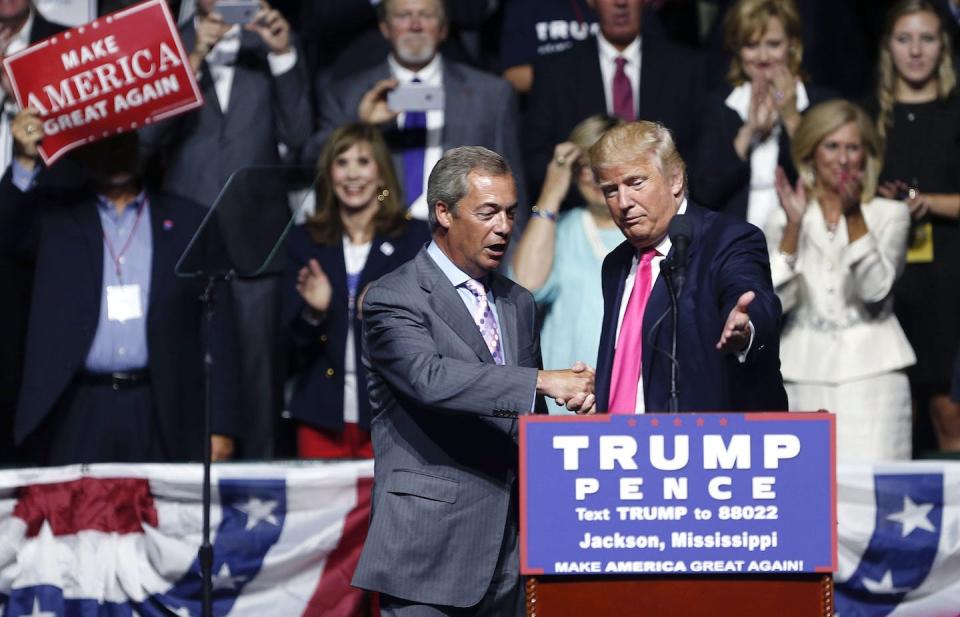 Donald Trump welcomes Nigel Farage to speak at a campaign rally during the 2016 U.S. presidential election. Farage has expressed his support for Trump in the upcoming 2024 election. (AP Photo/Gerald Herbert)