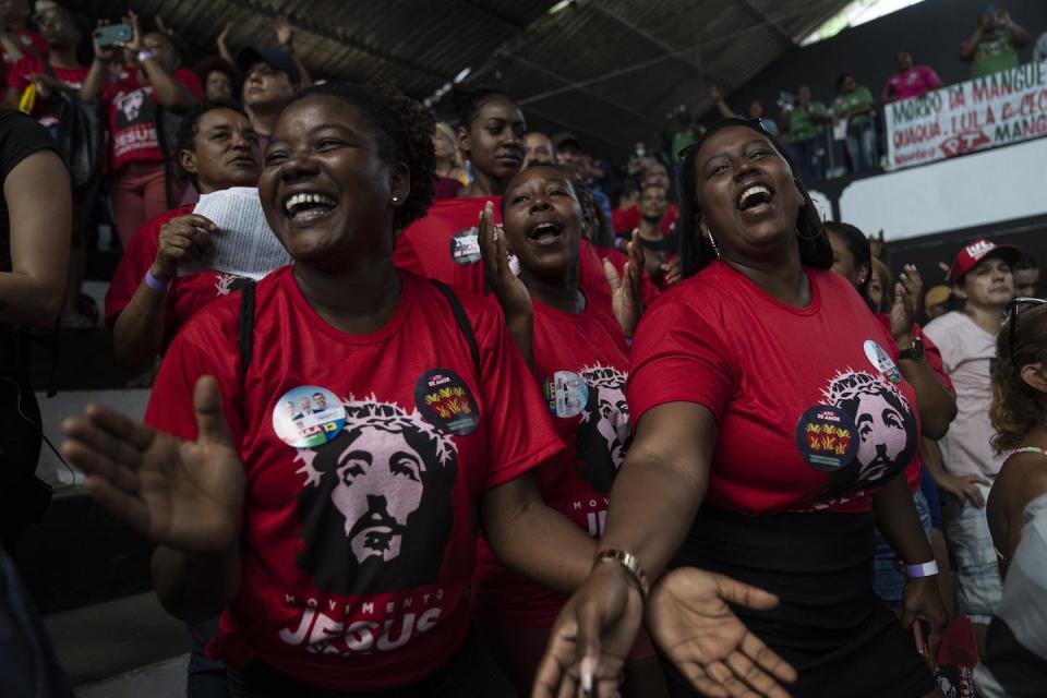 Evangelicals pray and dance during a campaign rally for former Brazilian President Luiz Inacio Lula da Silva on the outskirts of Rio de Janeiro on Sept. 9, 2022. <a href="https://newsroom.ap.org/detail/BrazilElections/486bc16881b846d6a1edc79d749f2c97/photo?Query=brazil%20pray&mediaType=photo&sortBy=arrivaldatetime:desc&dateRange=Anytime&totalCount=495&currentItemNo=8" rel="nofollow noopener" target="_blank" data-ylk="slk:AP Photo/Rodrigo Abd;elm:context_link;itc:0;sec:content-canvas" class="link ">AP Photo/Rodrigo Abd</a>