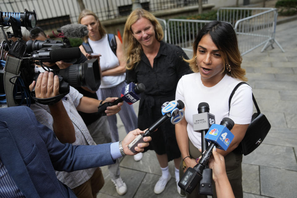 Sexual assault survivor Eva Santos Veloz speaks to members of the media after sentencing proceedings concluded for convicted sex offender Robert Hadden outside Federal Court, Tuesday, July 25, 2023, in New York. (AP Photo/John Minchillo)
