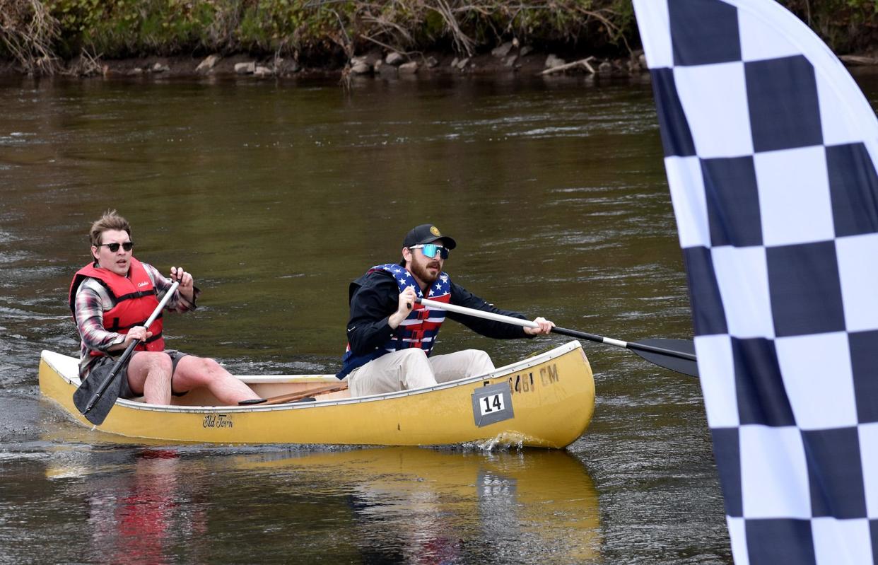 Levi Propst and Jordan Gallo cross the finish line with a solid time at the 2024 Wayne County Canoe Classic, hosted by the Honesdale Area Jaycees.