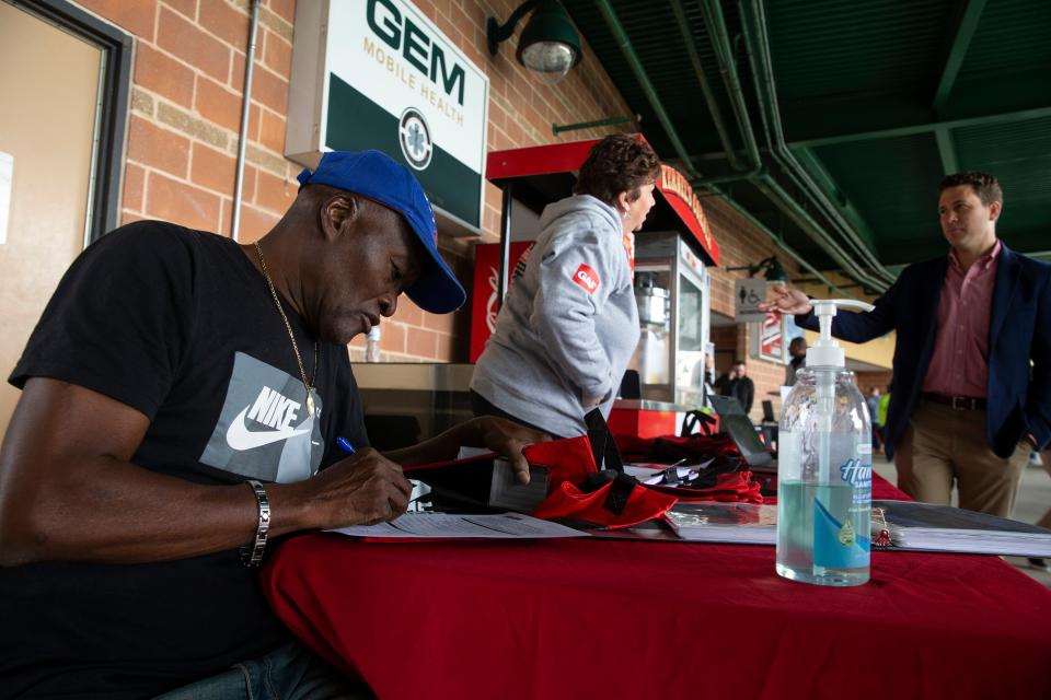 Job candidate Maxi Josue of Lakewood applies for a job at All-County Exteriors. Ocean County and state labor departments host a job fair for the construction industry at ShoreTown Ballpark. Students of the Ocean County Vocational Technical Schools were brought in to apply for jobs. Lakewood, NJWednesday, May11, 2022