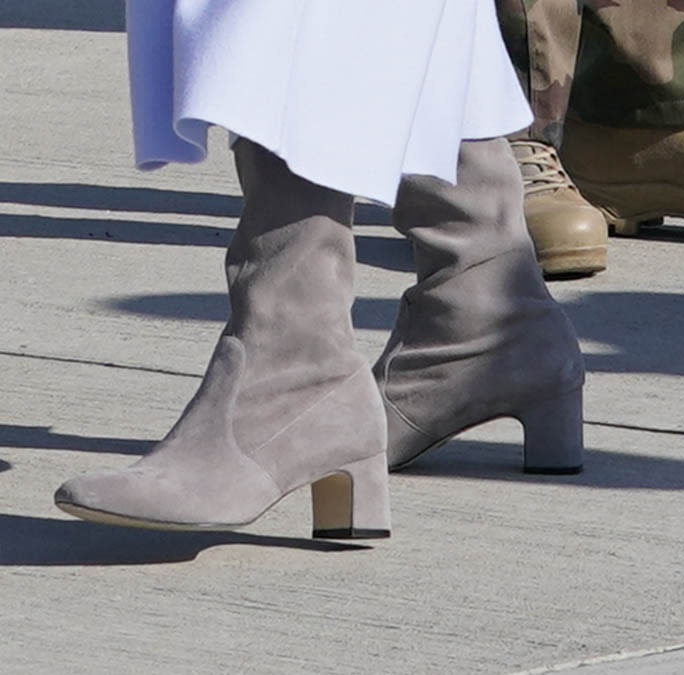 A closer look at Jill Biden’s grey suede boots at the Mihail Kogalniceanu Air Base in - Credit: AP