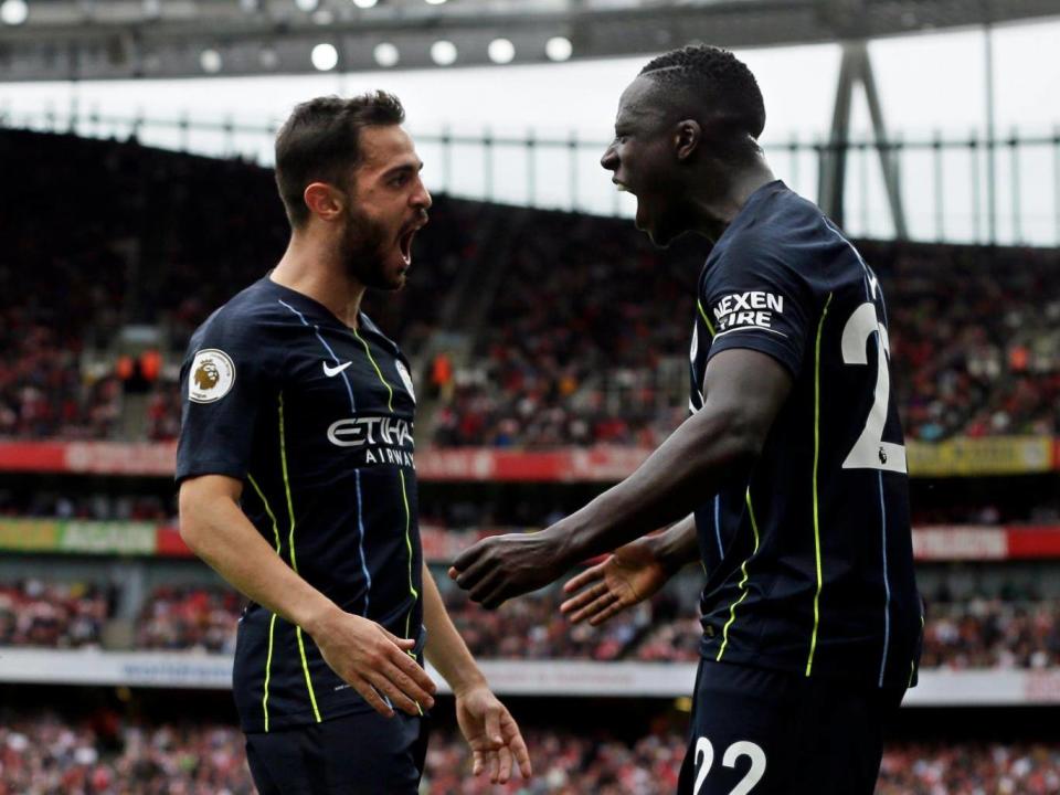 Mendy set-up Bernardo Silva to score City's second goal and kill-off Arsenal's hopes (AP)