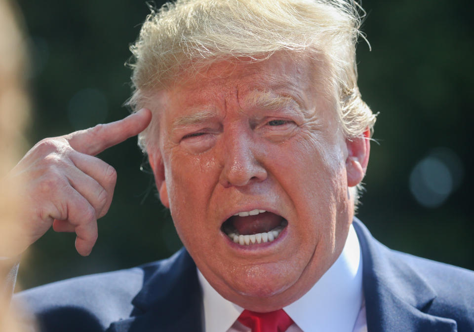 U.S. President Donald Trump talks to reporters as he departs for travel to New York and New Jersey from the South Lawn of the White House in Washington, U.S., August 9, 2019. REUTERS/Leah Millis