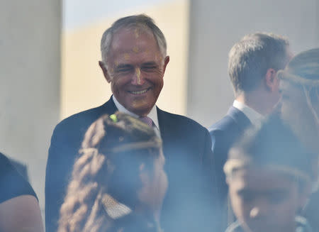 Australian Prime Minister Malcolm Turnbull participates in a traditional smoking ceremony marking the start of Australia's new Parliament session at Parliament House in Canberra, August 30, 2016. AAP/Mick Tsikas/via REUTERS