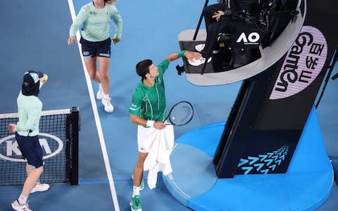 Djokovic has a word with the umpire - Credit: AFP