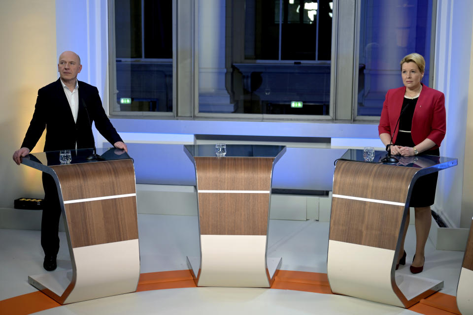 The top candidates of the Christian Democratic Union party (CDU), Kai Wegner, left, and the Social Democratic Party (SPD) and Mayor of Berlin, Franziska Giffey, right, stay in a television studio in Berlin Germany, Sunday, Feb. 12, 2023. Germany’s conservative Christian Democrats on Monday celebrated their victory in a Berlin state election re-run made necessary by serious voting glitches in 2021. The party said the result shows it can appeal to voters in urban areas with center-right policies that include tough talk on immigration. (Sebastian Christoph Gollnow/dpa via AP)