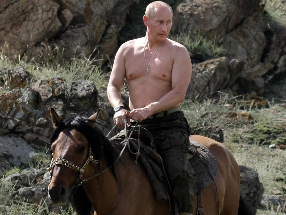 Russian Prime Minister Vladimir Putin rides a horse during his vacation outside the town of Kyzyl in Southern Siberia on August 3, 2009.