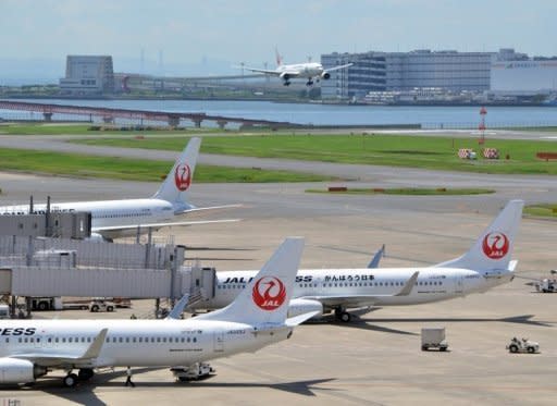 Japan Airlines marked a spectacular return from bankruptcy when its shares soared in early trade after relisting in Tokyo, three years after it became one of the nation's worst ever failures