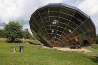 The Heliodome, a bioclimatic solar house is seen in Cosswiller in the Alsacian countryside near Strasbourg, Eastern France, August 4, 2011. The house is designed as a giant three-dimensional sundial, set on a fixed angle in relationship to the sun's movements to provide shade during the summer months, keeping the inside temperature cool, and during Fall, Winter and Spring sunlight enters the large windows as the sun's position is lower in the sky, thus warming the living space. REUTERS/Vincent Kessler (FRANCE - Tags: ENERGY ENVIRONMENT SOCIETY) - RTR2PLUX