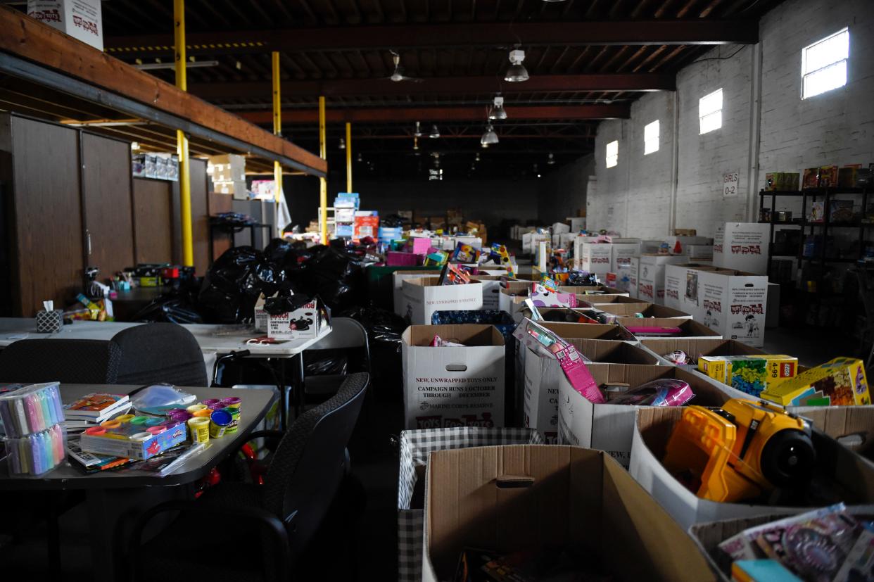 FILE - Toys sit in boxes at the U.S. Marine Corps Toys for Tots warehouse in Augusta. The organization and Miracle Making Ministries are collecting donations now.