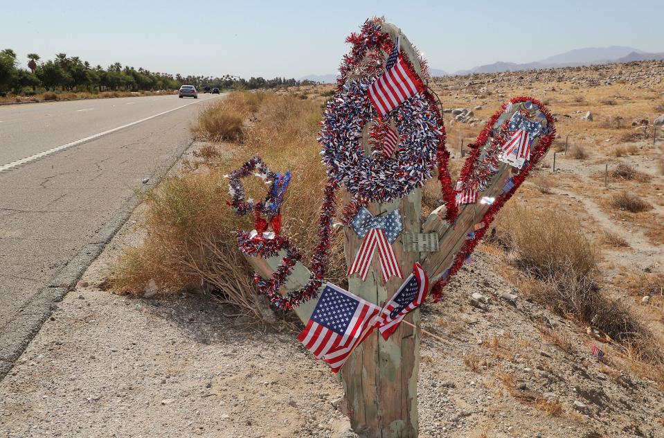 A wooden cactus sculpture that's been on the side of Hwy 111 for some time has been redocorated in a patriotic theme near San Rafael Rd. in Palm Springs, Calif., June 28, 2022.