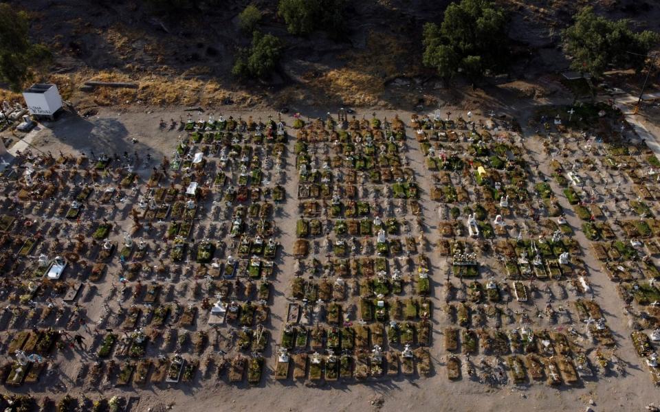 Graves are seen at the Xico cemetery, as the coronavirus outbreak continues, in Valle de Chalco, in the State of Mexico - Reuters