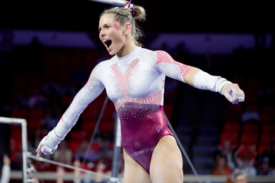 OU gymnast Jordan Bowers celebrates after scoring a perfect 10 on the bars during Thursday's NCAA Regional at Lloyd Noble Center in Norman.