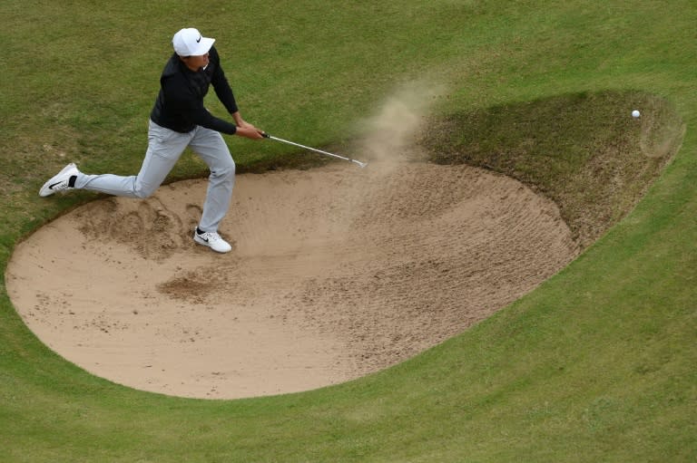 China's Li Haotong fails to get out of a bunker on the 12th hole on July 21, 2017