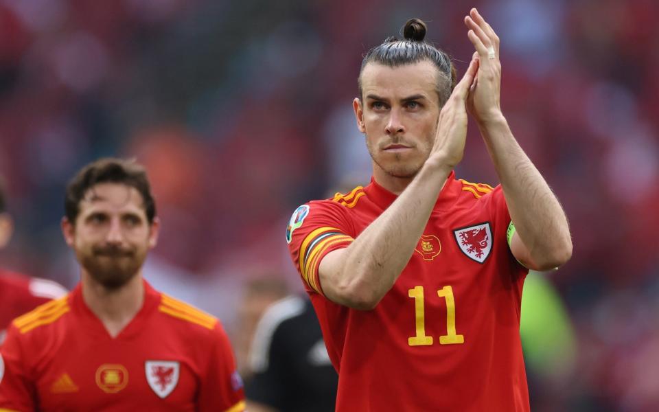 Gareth Bale applauds the fans after Wales' 4-0 defeat to Denmark in Amsterdam - REUTERS