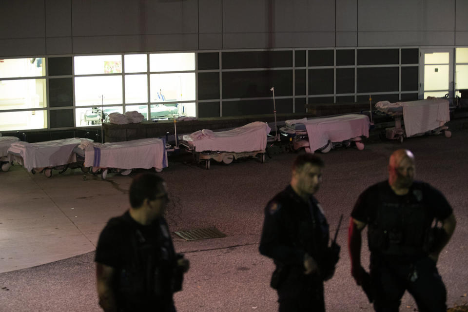 Stretchers are lined up outside the emergency room at Central Maine Medical Center following shootings in Lewiston, Maine, Wednesday, Oct. 25, 2023. (Derek Davis/Portland Press Herald via AP)