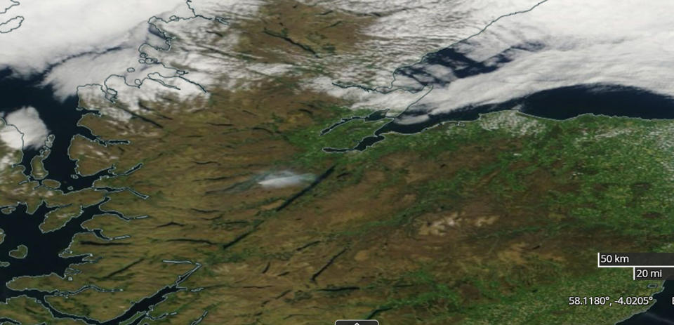 Screenshot from Nasa worldview satellite showing the plume of smoke (centre) from the fire at Cannich. (PA)