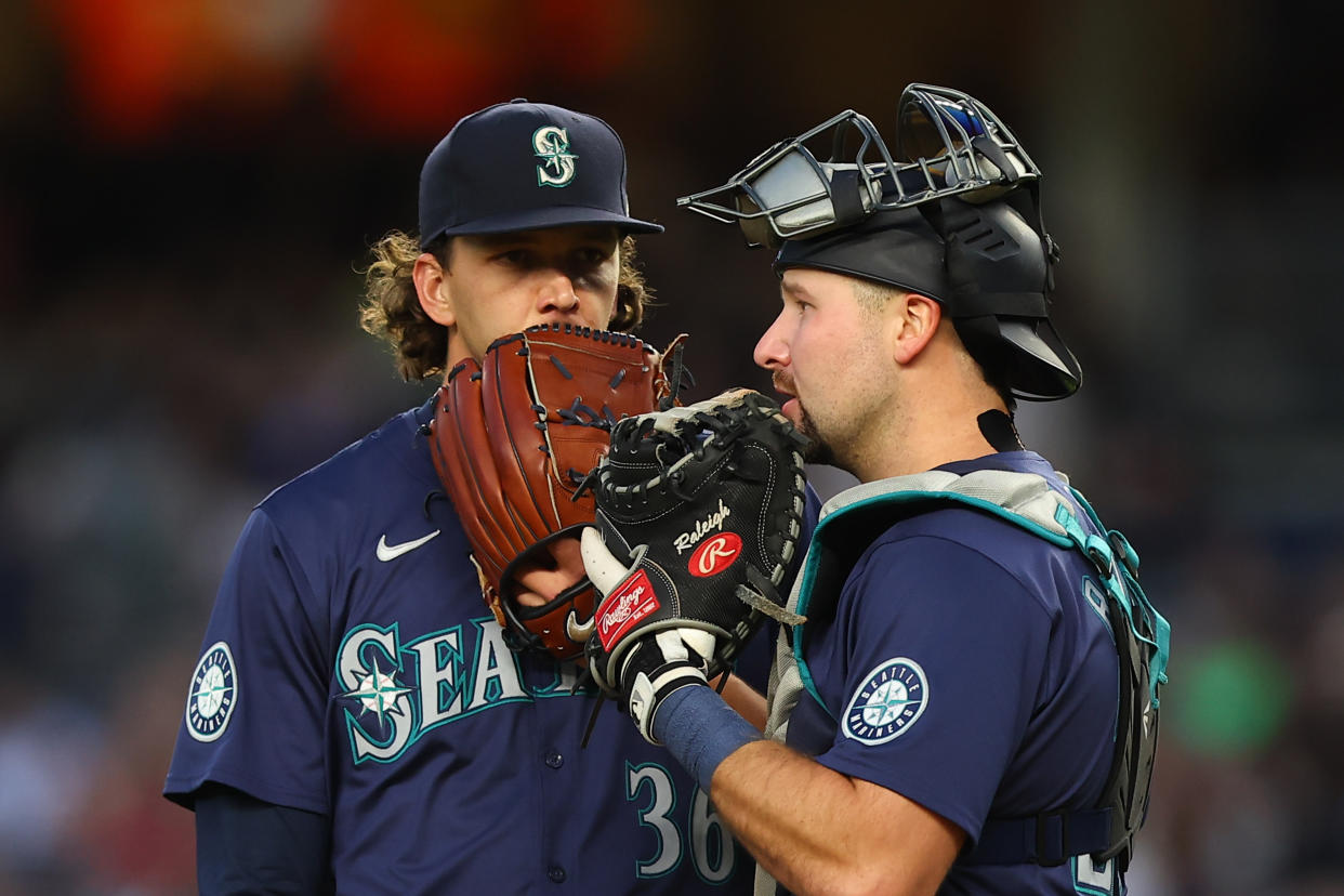 Once college opponents, Logan Gilbert (left) and Cal Raleigh have been helping each other improve since they were drafted in 2018. (Photo by Rich Graessle/Icon Sportswire via Getty Images)