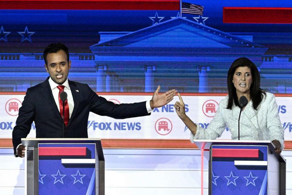 PHOTO: Entrepreneur and author Vivek Ramaswamy and former Governor from South Carolina and UN ambassador Nikki Haley gesture as they speak during the first Republican Presidential primary debate at the Fiserv Forum in Milwaukee, Aug. 23, 2023. (Brendan Smialowski/AFP via Getty Images)