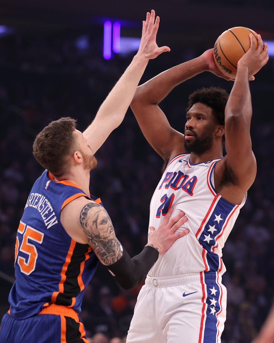 Philadelphia 76ers center Joel Embiid (21) controls the ball against New York Knicks center Isaiah Hartenstein (55) during the first quarter of game 5 of the first round of the 2024 NBA playoffs at Madison Square Garden.