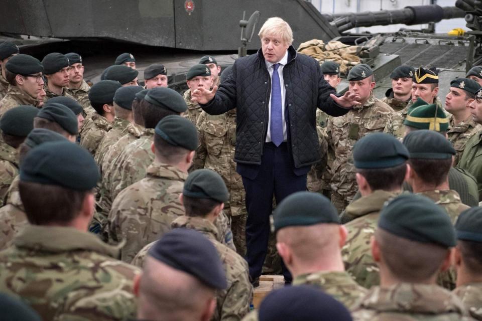 Boris Johnson speaks with the Queen's Royal Hussars stationed in Estonia at the Tapa military base (POOL/AFP via Getty Images)