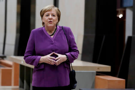 German Chancellor Angela Merkel arrives at the official dinner at the Orsay Museum, as part of the commemoration ceremony for Armistice Day, 100 years after the end of the First World War, in Paris, France, November 10, 2018. Ian Langsdon/Pool via REUTERS