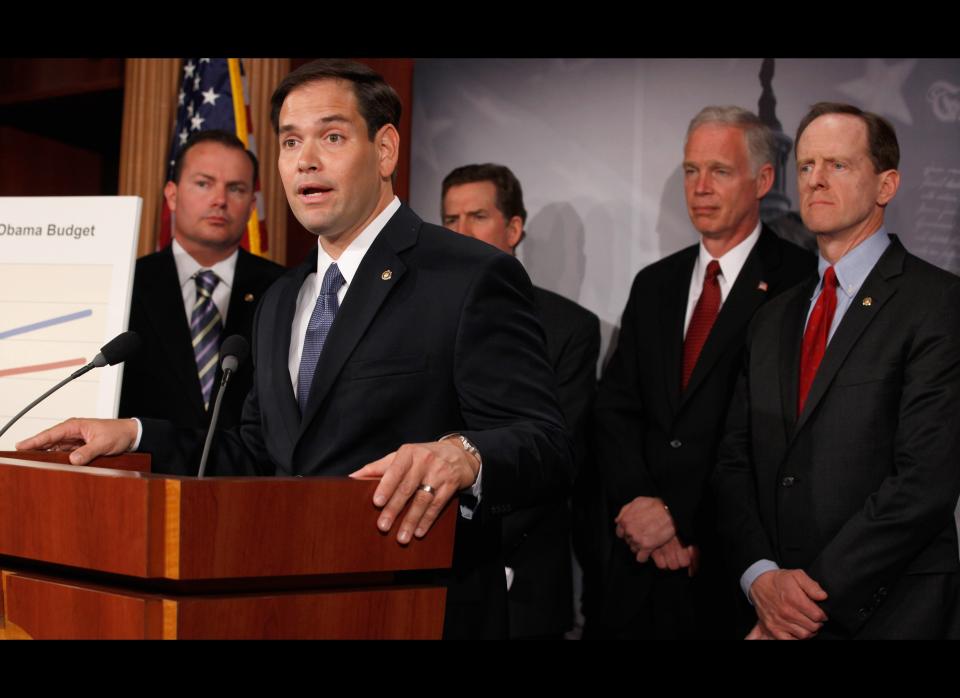 WASHINGTON, DC - MAY 10:  Sen. Marco Rubio (R-FL) (2nd L) answers reporters' questions during a news conference to introduce a balanced budget proposal with (L-R) Sen. Mike Lee (R-UT), Sen. Jim DeMint (R_SC), Sen. Ron Johnson (R-WI), and nd Sen. Pat Toomey (R-PA) at the U.S. Capitol May 10, 2011 in Washington, DC. Toomey said the proposal will balance the federal budget by 2020.  (Photo by Chip Somodevilla/Getty Images)