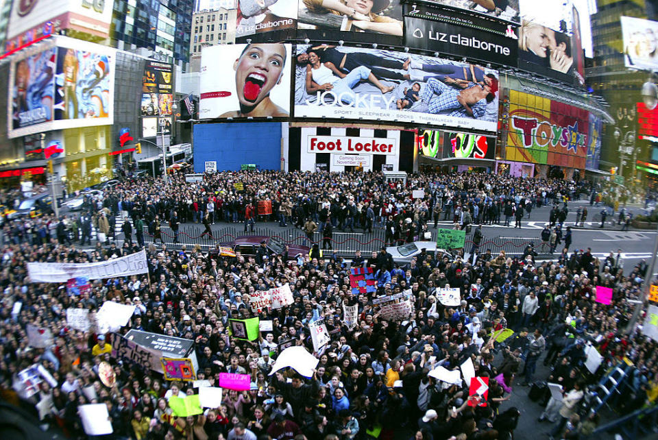 a crowd of people take over times square