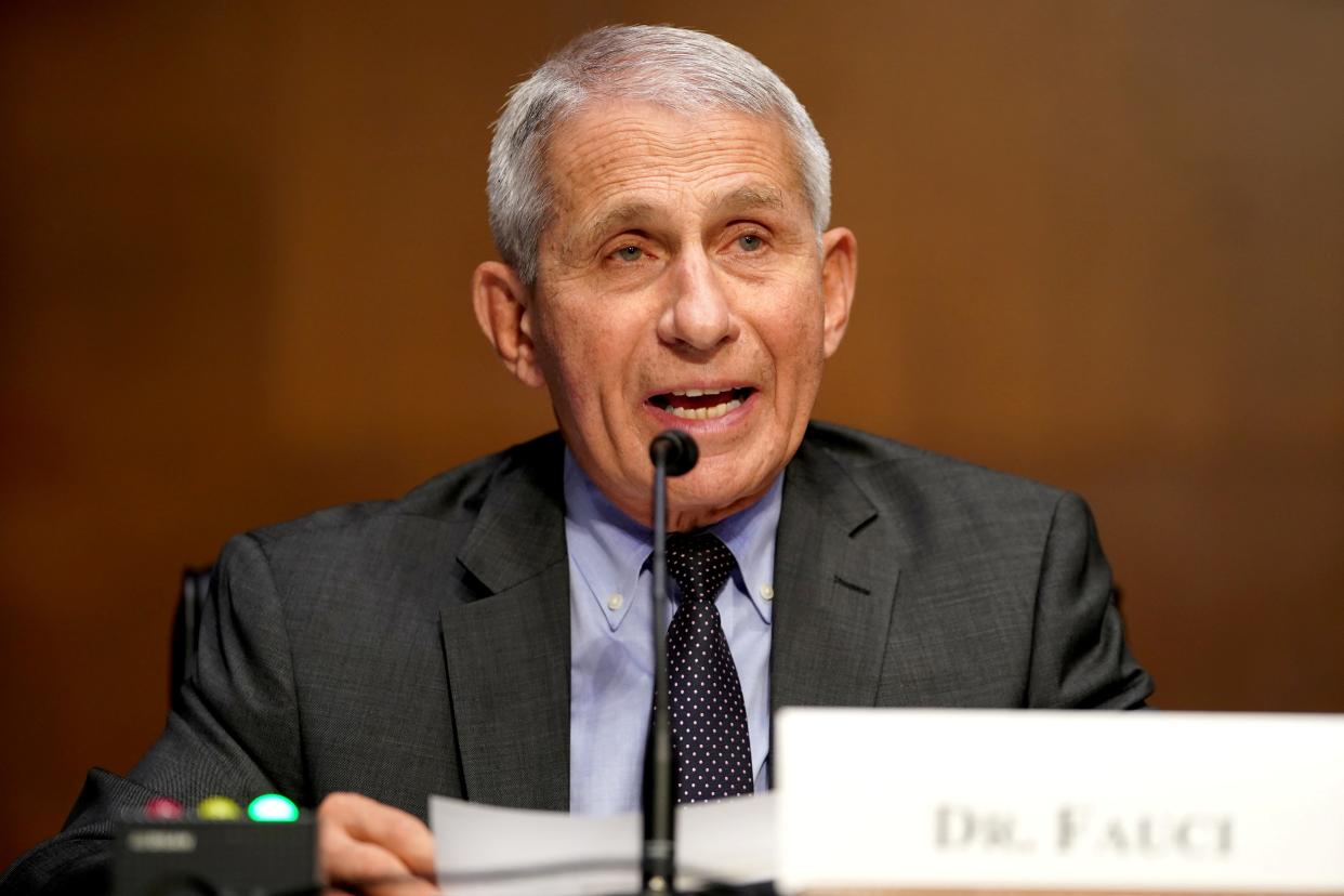 <p>Dr Fauci says early research indicates the Covid vaccines are effective against the Indian variants</p> (REUTERS)