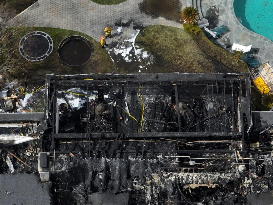 An aerial view shows the fire-damaged property (Copyright 2024 The Associated Press. All rights reserved)