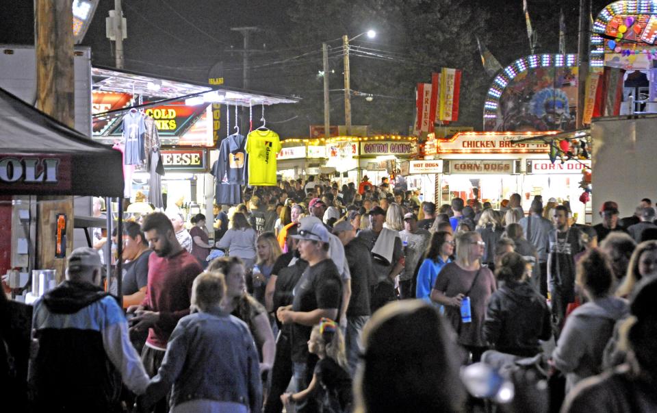 Crowds enjoy a day at the Wayne County Fair.